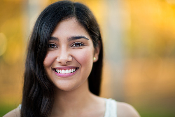 Young lady smiling with a perfect smile